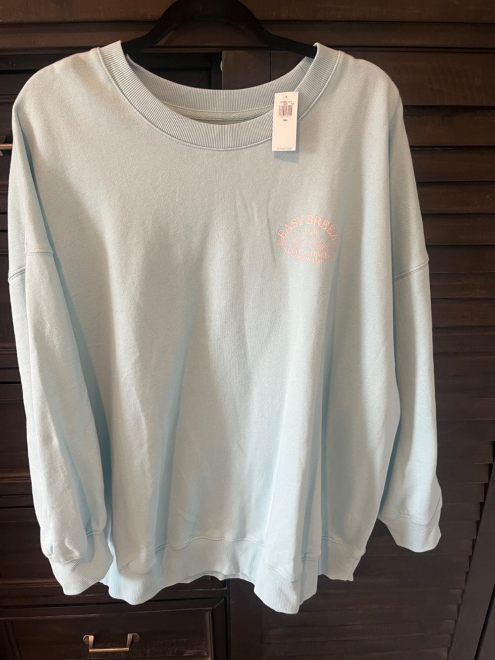 Old Navy Light Blue Crewneck Sweatshirt with graphics